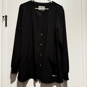 Skechers Stability 2-Pocket Crewneck Snap-Front Scrub Jacket